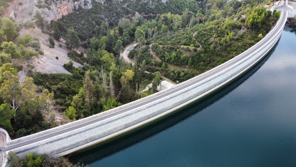 an aerial view of a bridge over a river