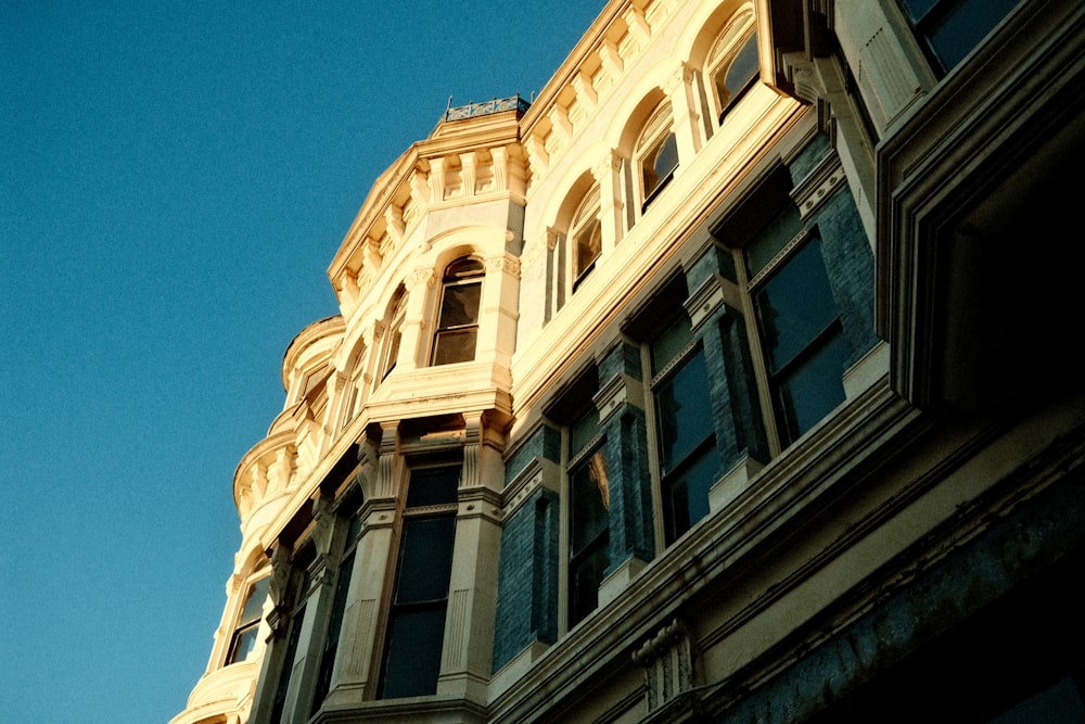 a tall building with a clock on the top of it