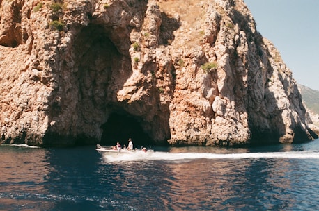 Tourists enjoying a boat trip to the Blue Caves.