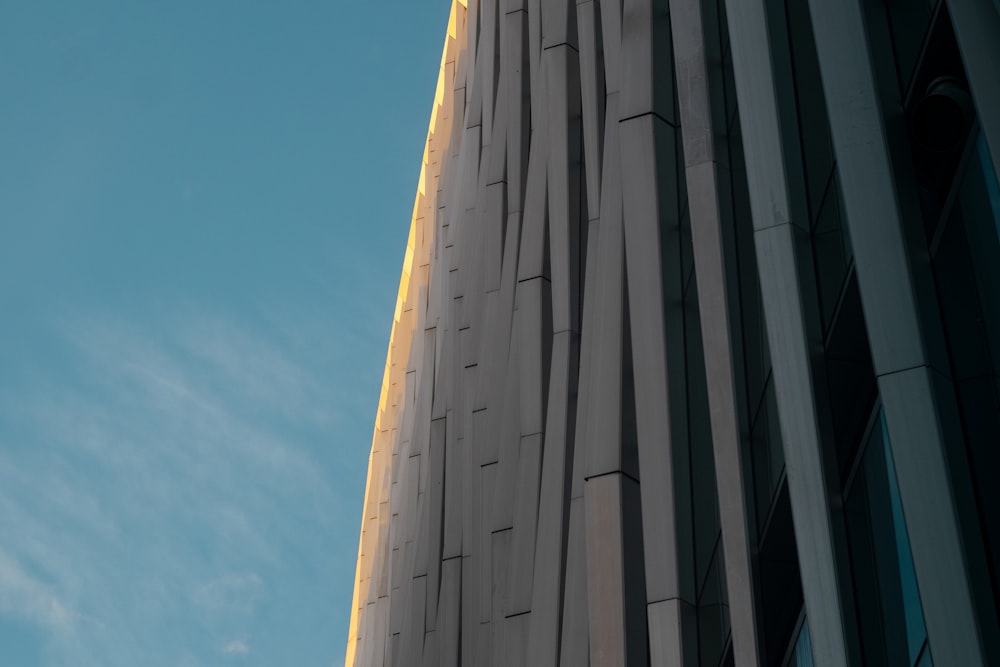 a tall building with a clock on the side of it