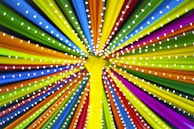 A vibrant fabric frame system set up at a bustling retail event in Mumbai.