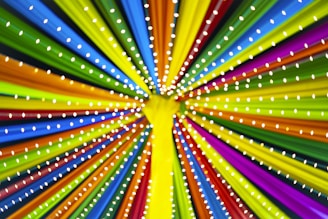 A vibrant fabric frame system set up at a bustling retail event in Mumbai.