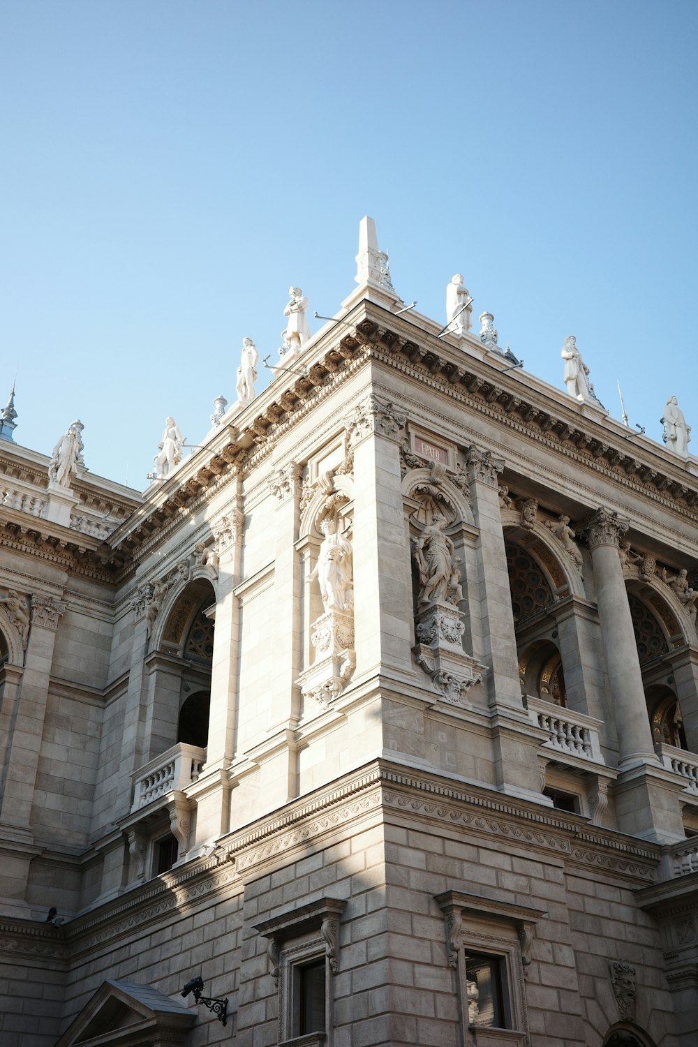 a large building with a clock on the front of it