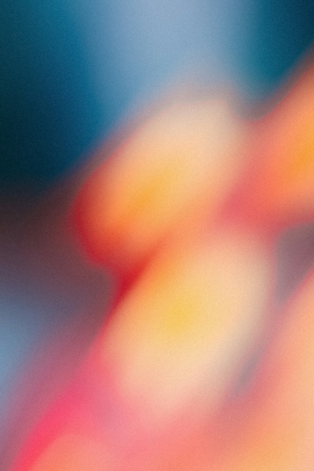 a blurry image of a red and yellow object