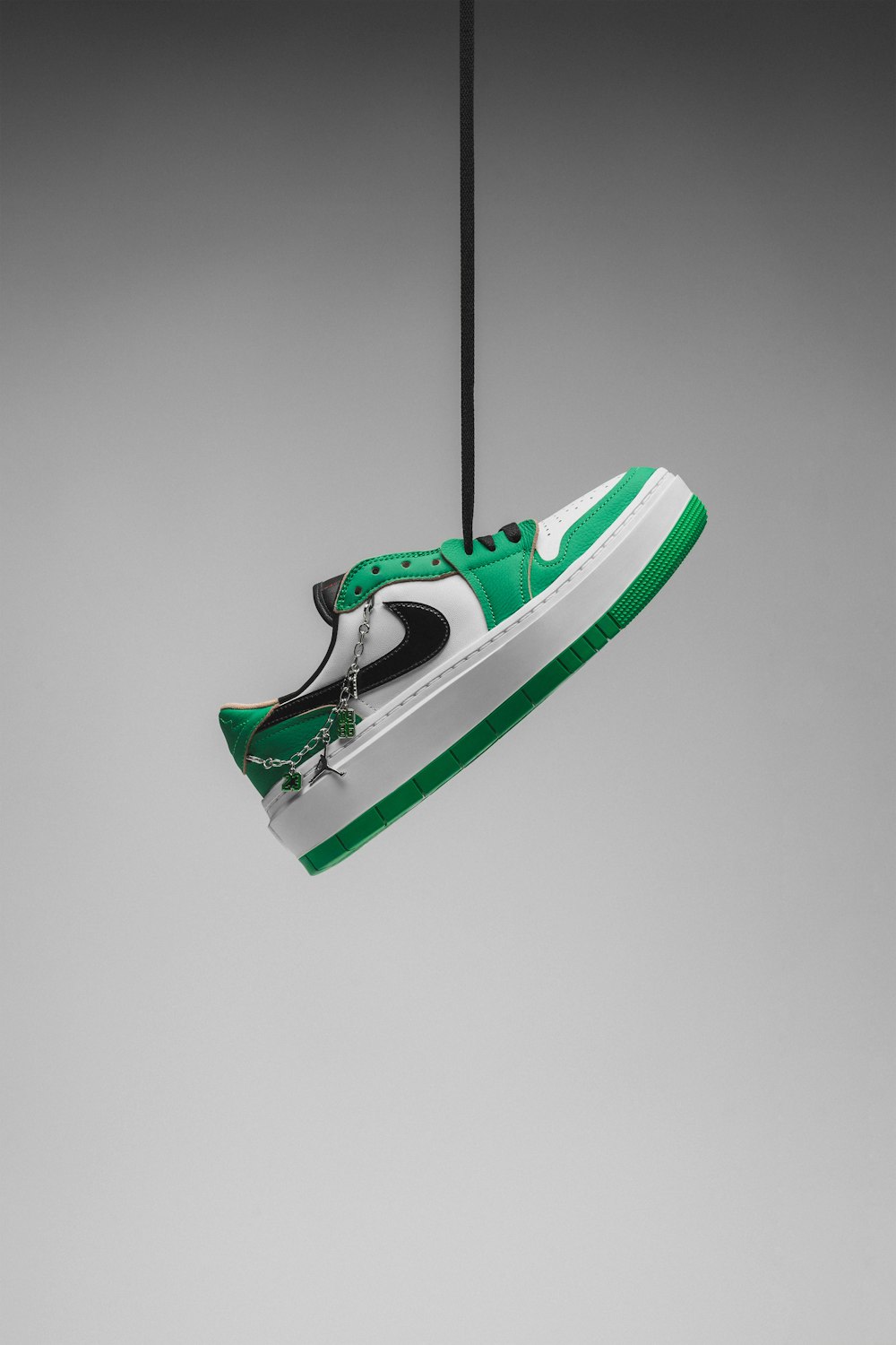 a pair of shoes hanging from a string