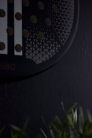 A close-up of a modern portable shower unit.