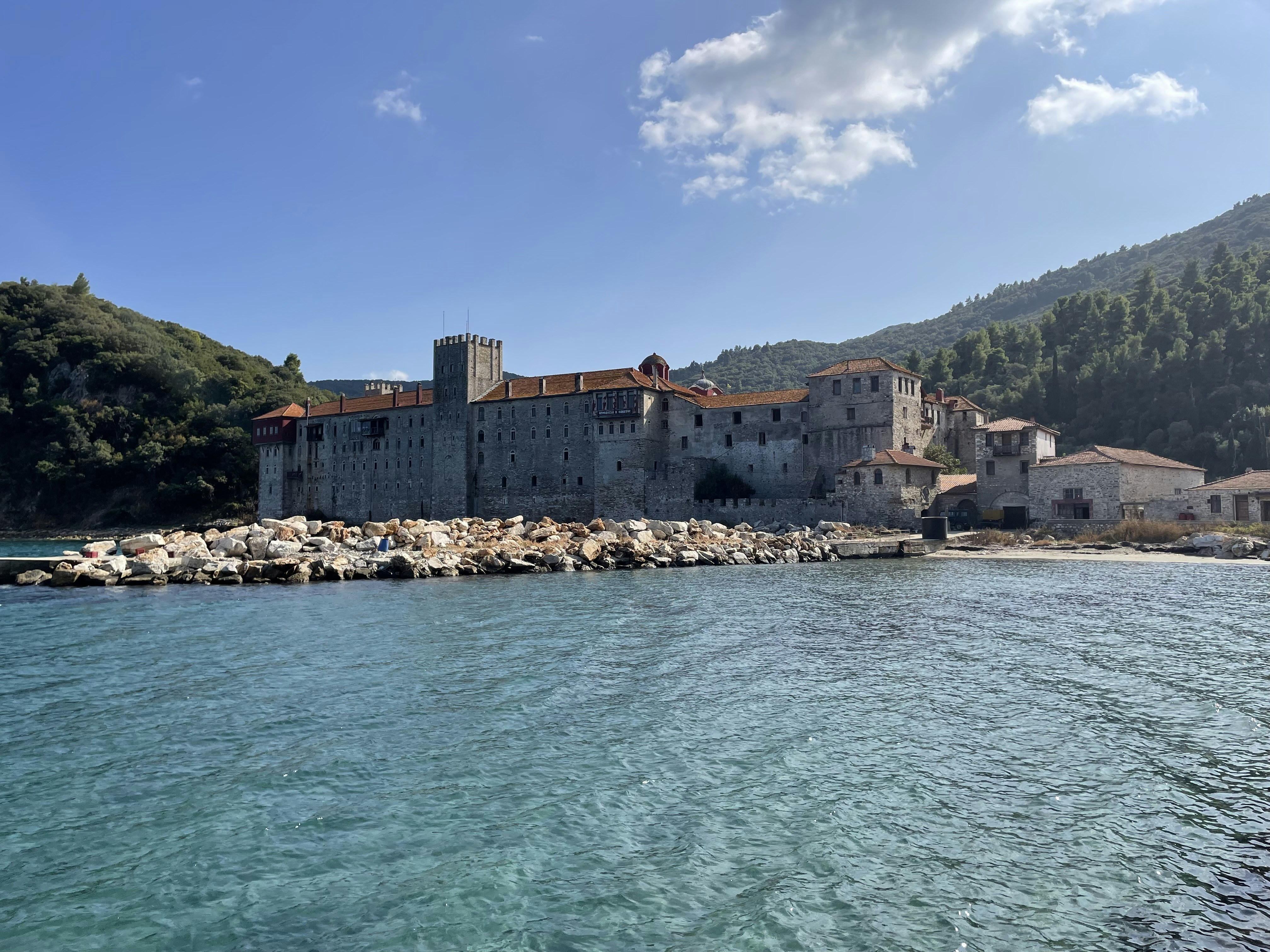 a large building sitting on top of a body of water