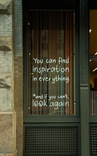 a store window with a message written on it