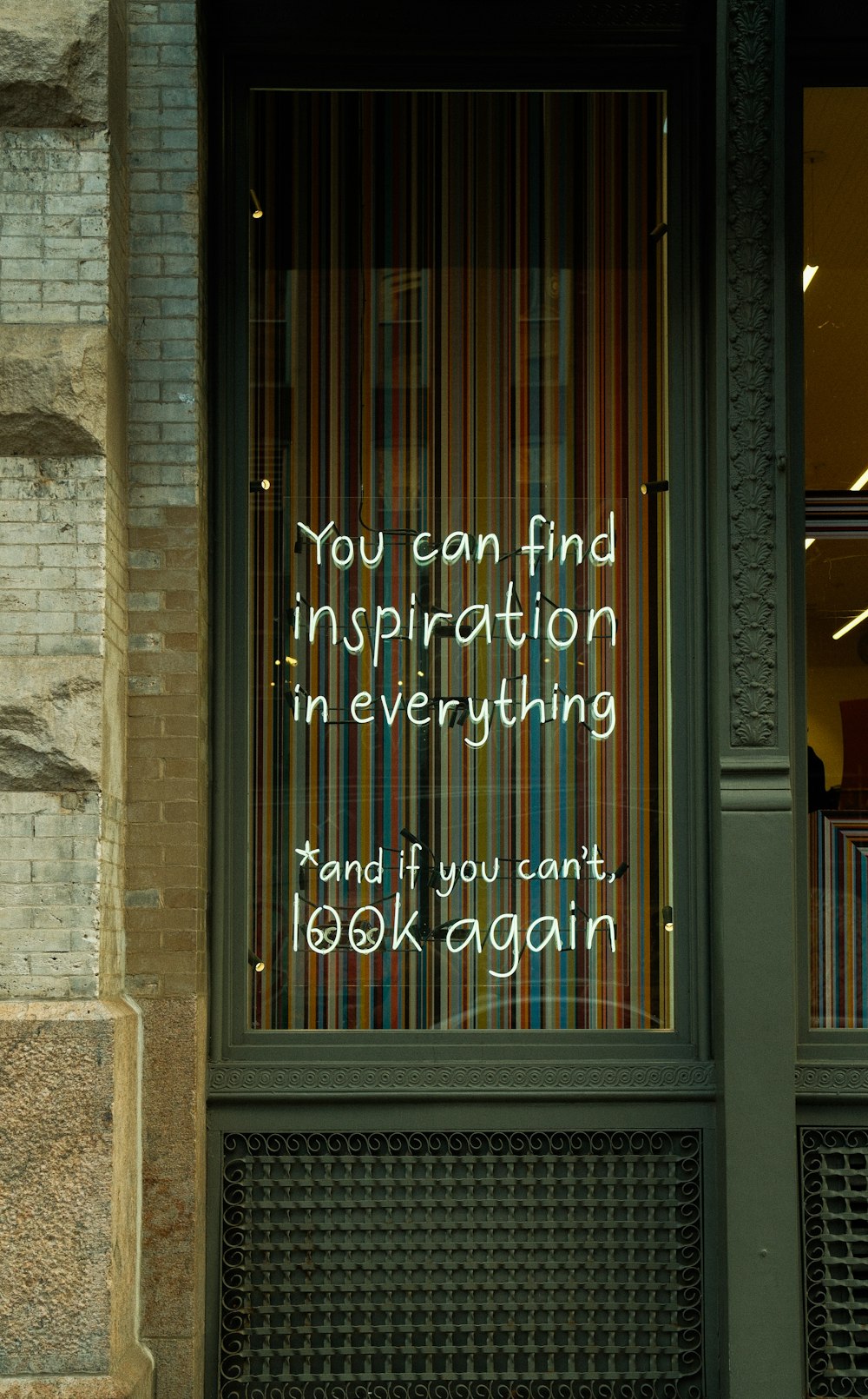 a store window with a message written on it