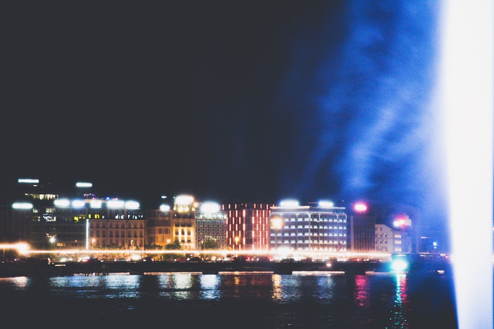 a view of a city at night from across the water