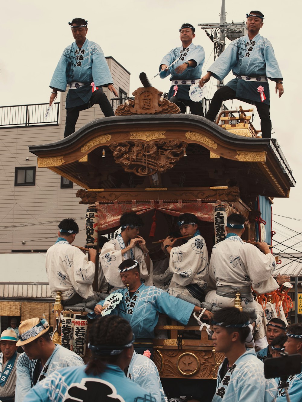 a group of people riding on the back of a float