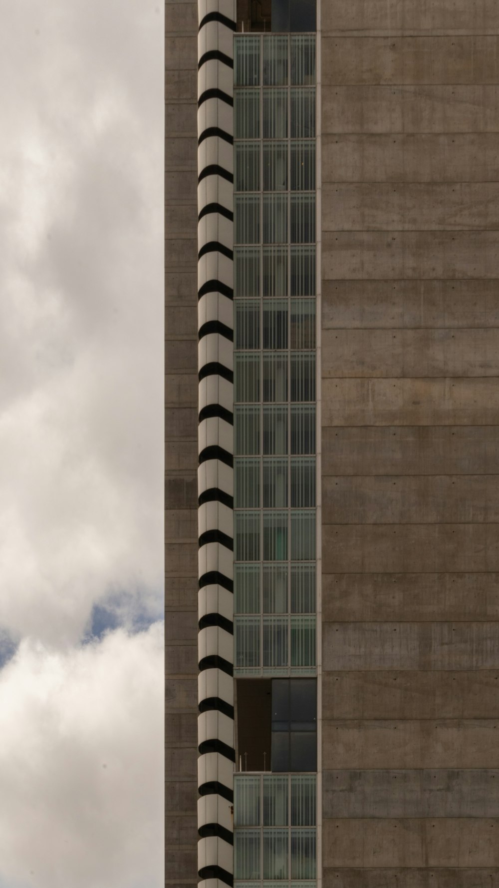 a tall building with a clock on the side of it