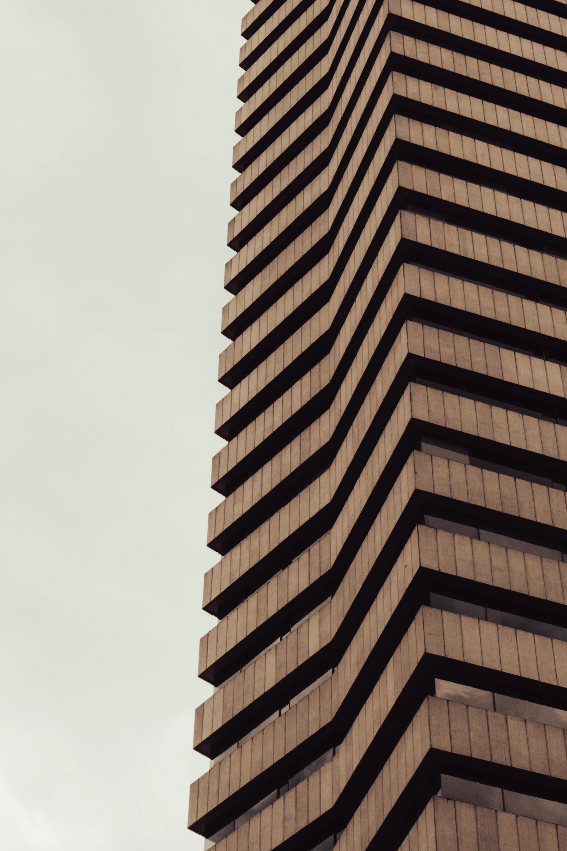 a tall building with a clock on the top of it