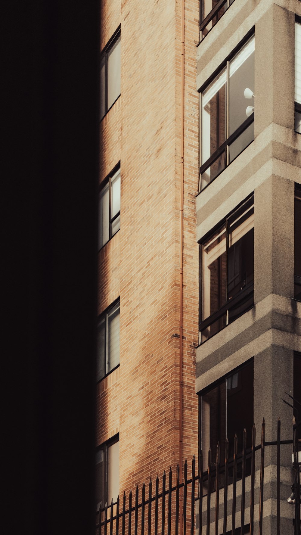 a tall building with a clock on the side of it