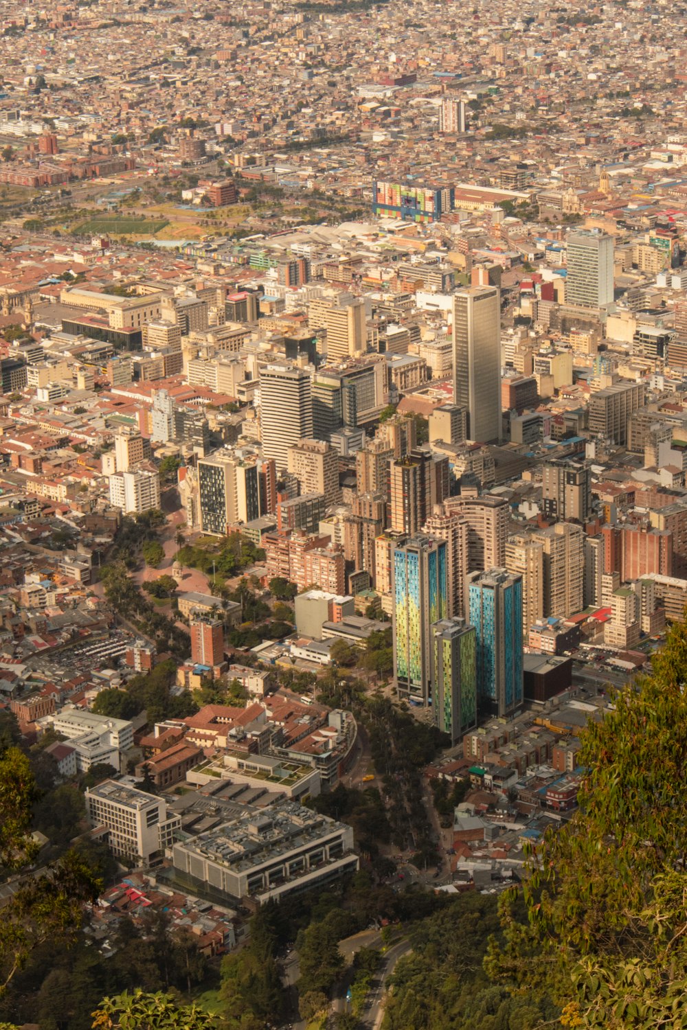 a view of a city from the top of a hill