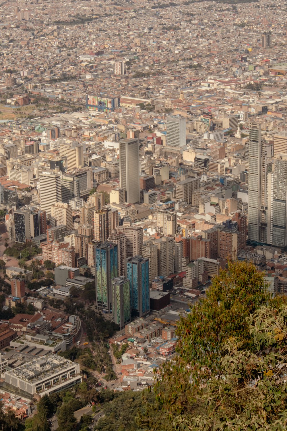 a view of a city from the top of a hill