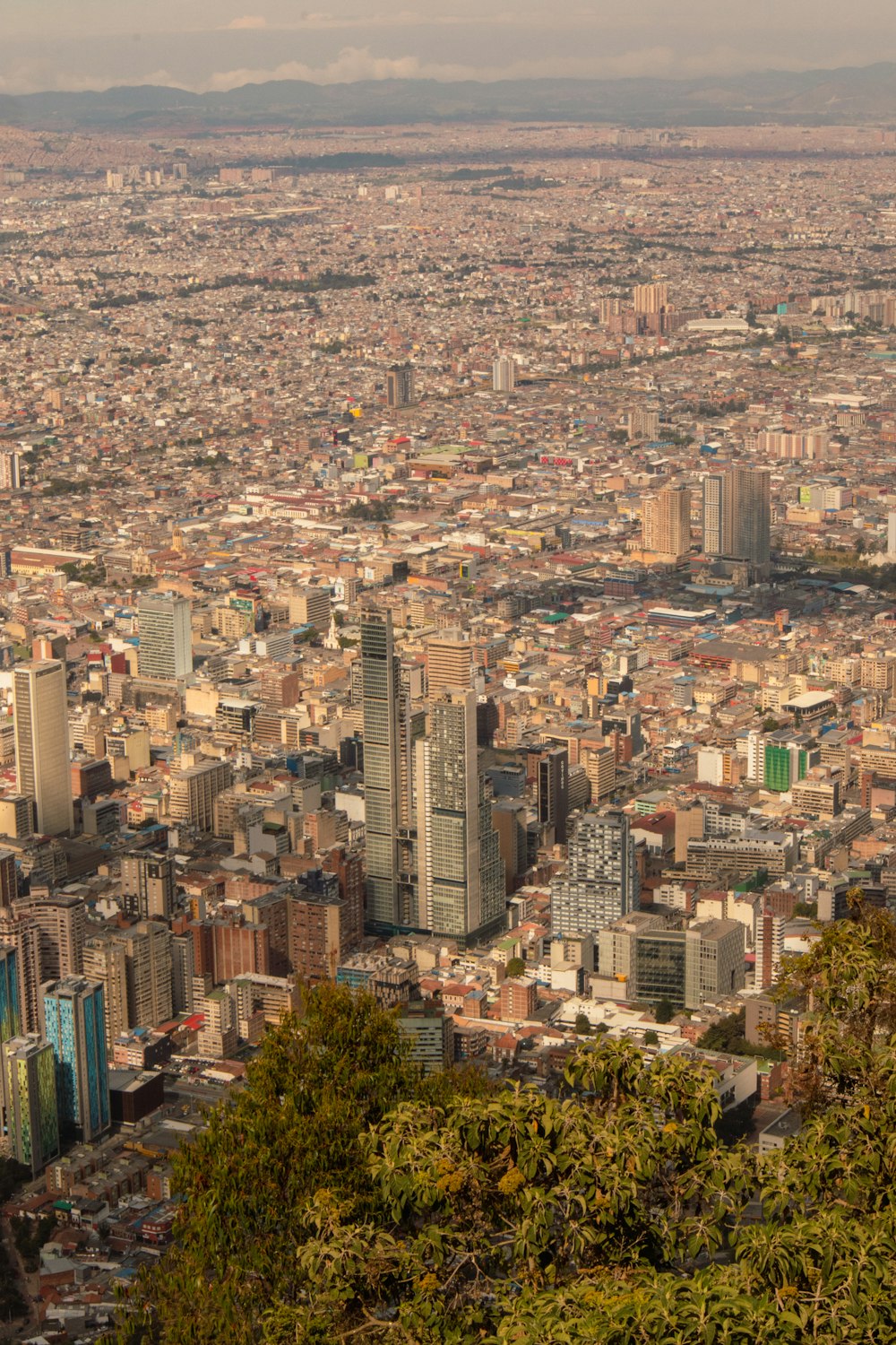 a view of a city from the top of a hill