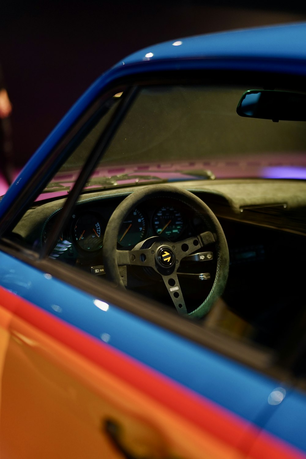 a close up of a steering wheel on a car