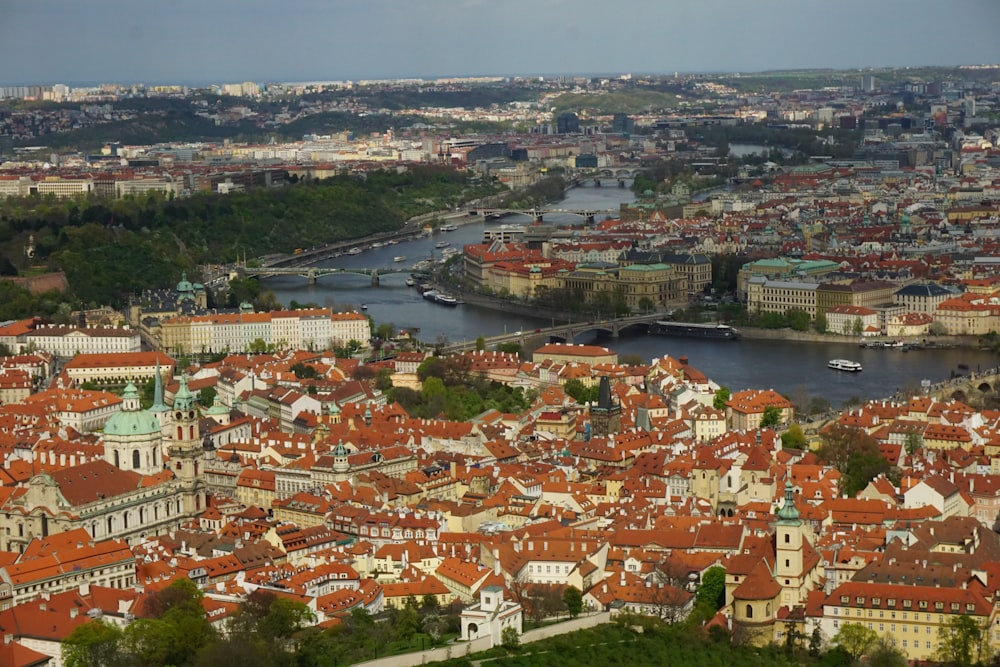 an aerial view of a city with a river running through it