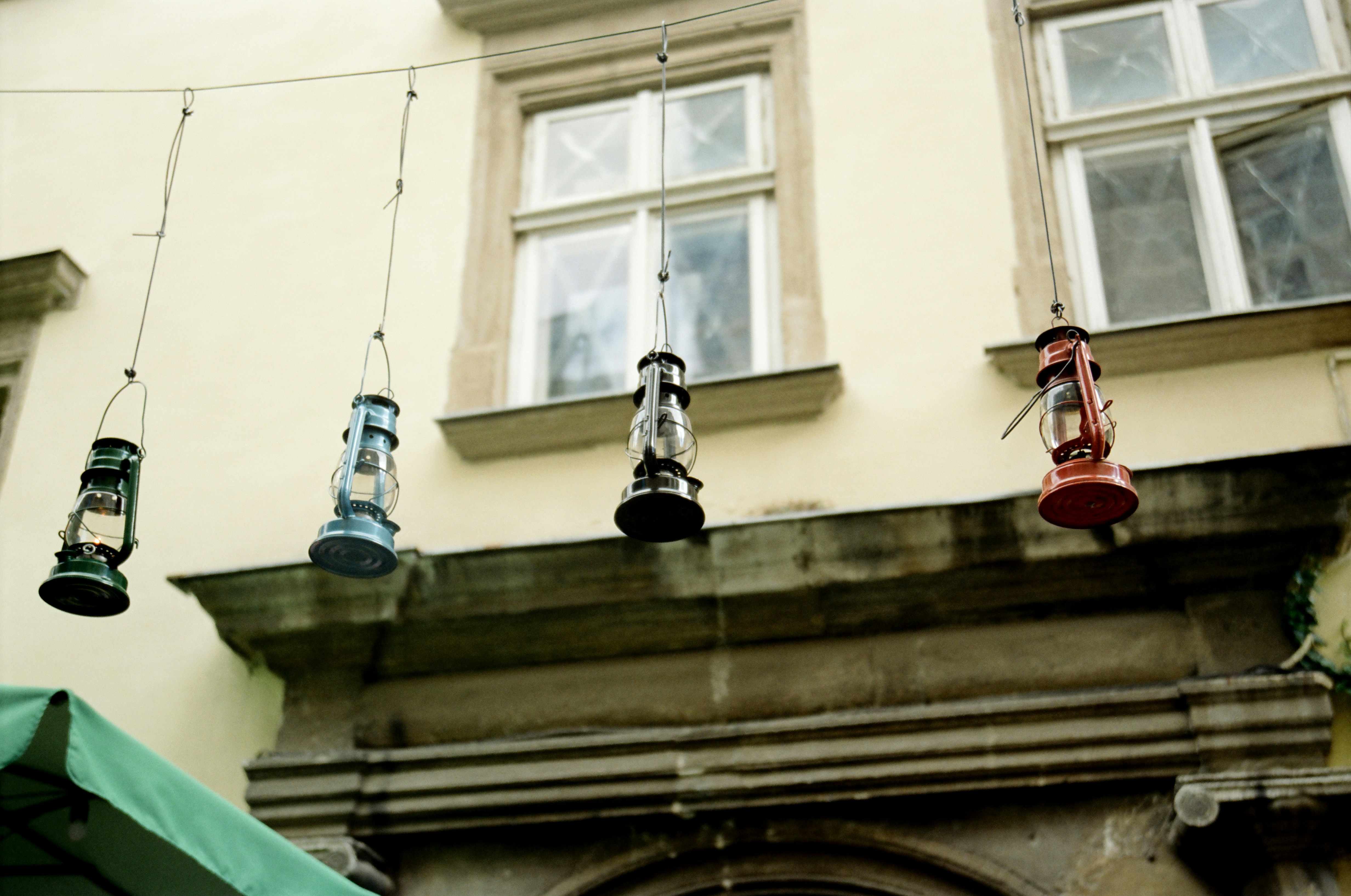 a number of hanging items near a building