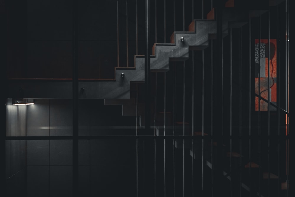 a stair case with a light at the bottom of it