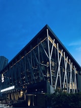 Modern building exterior at dusk, symbolizing strength and forward-thinking.