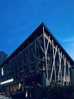 Modern building exterior at dusk, symbolizing strength and forward-thinking.
