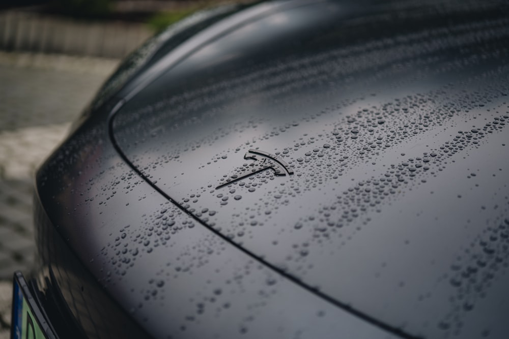 a close up of the hood of a car