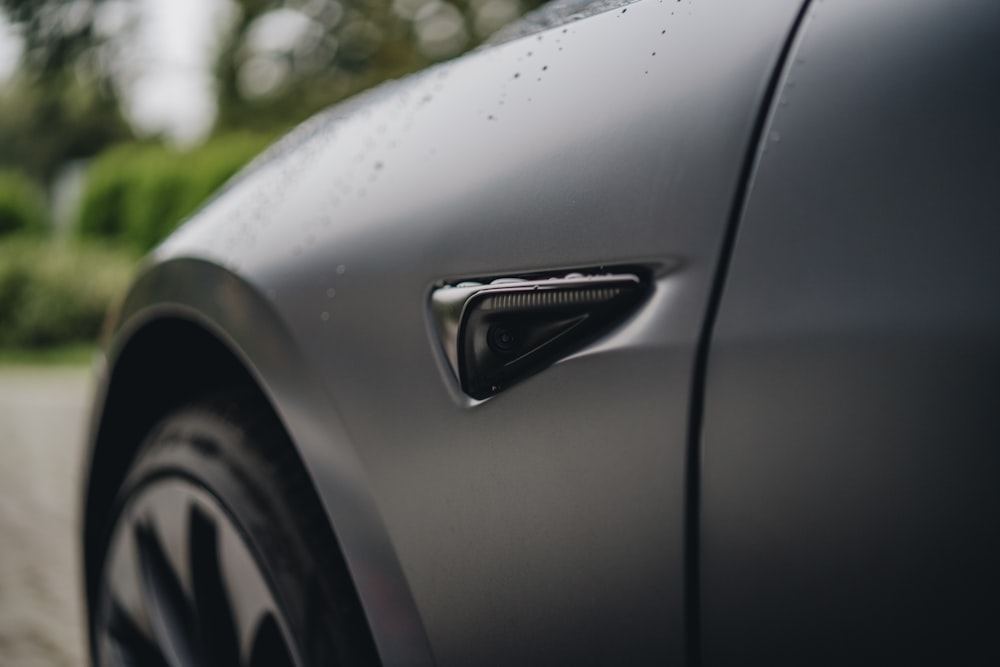 a close up of a car's door handle