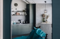 A modern kitchen with high-end concrete countertops.