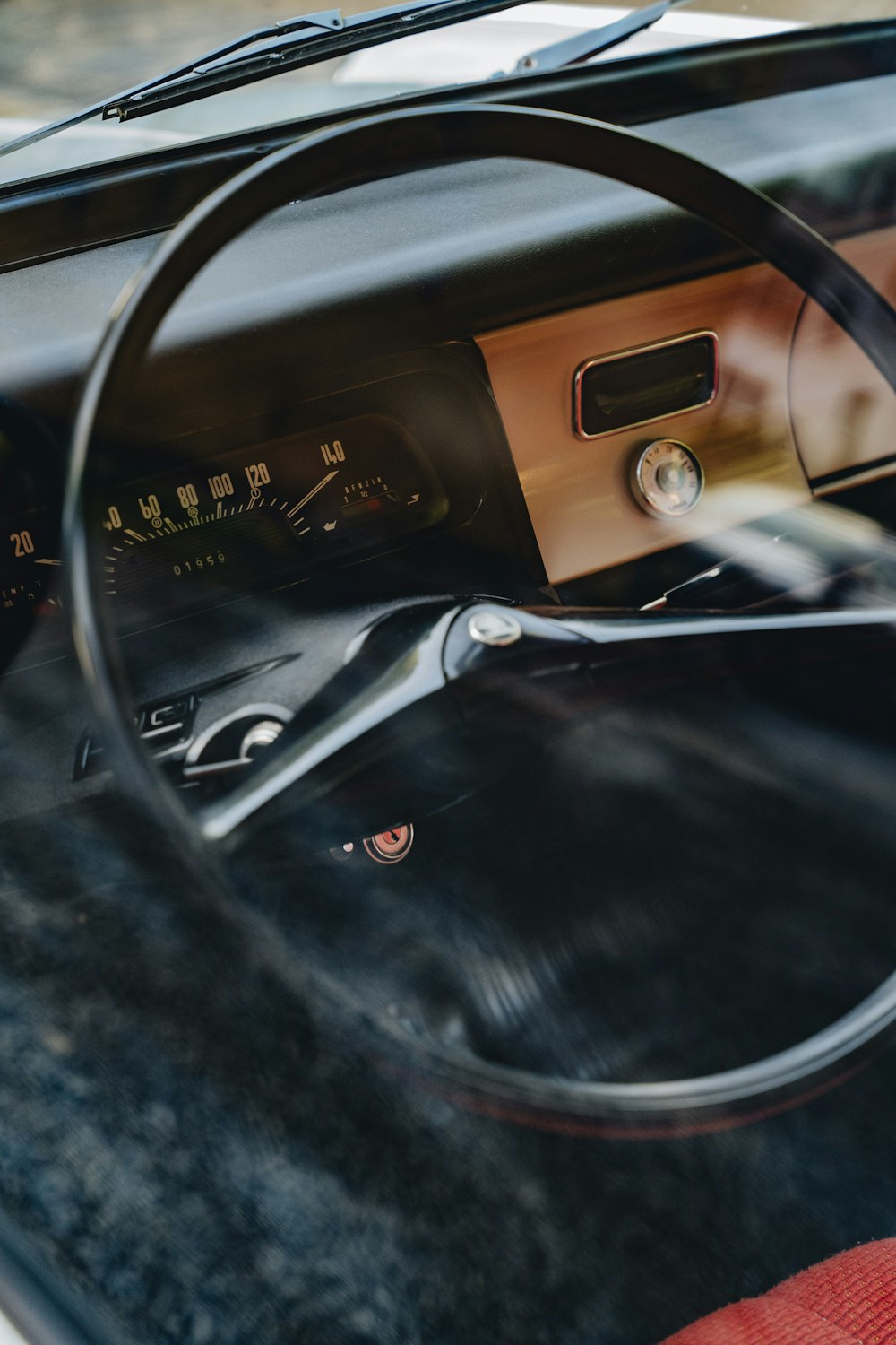 a steering wheel and dashboard of a car