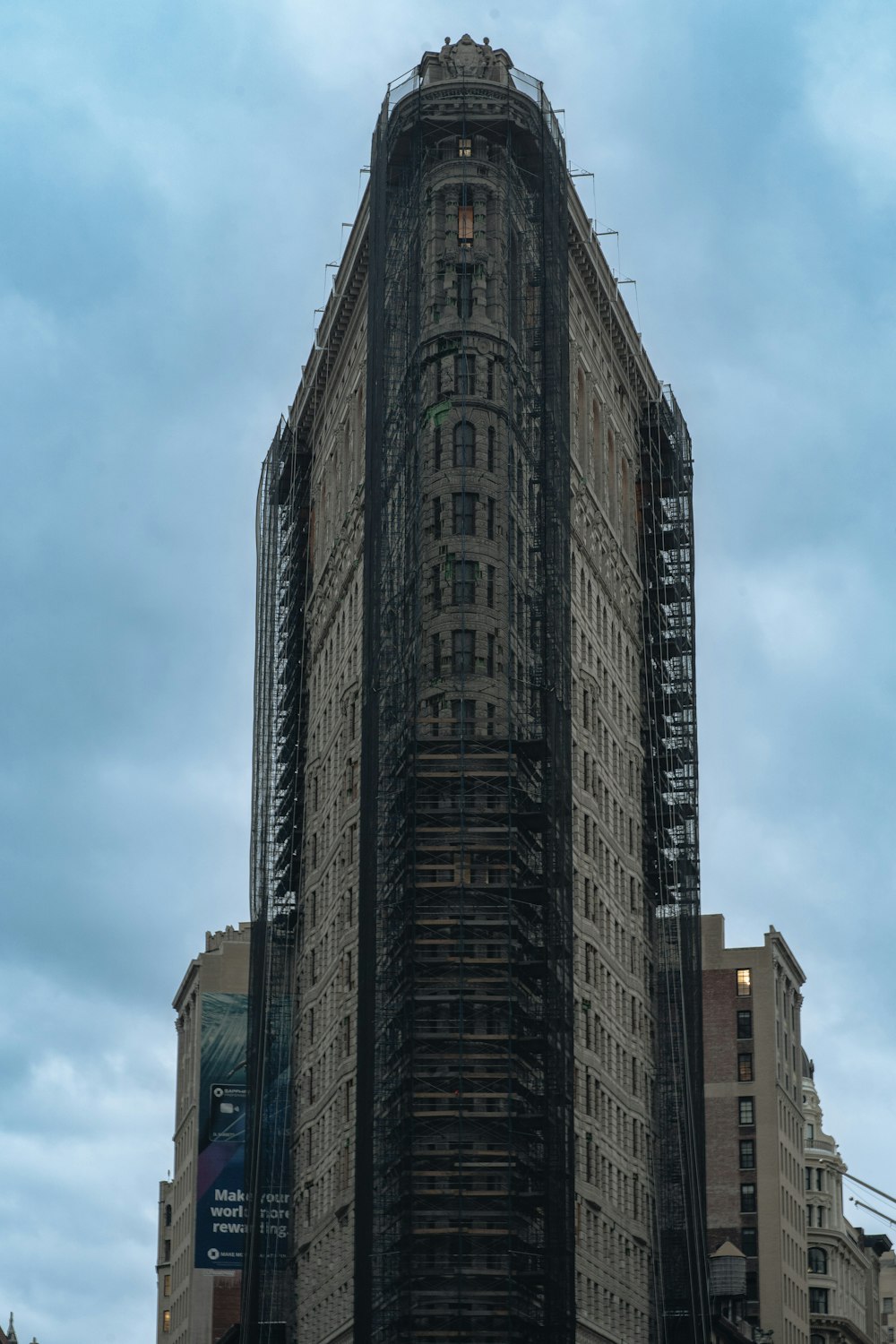 a tall building with a clock on the top of it