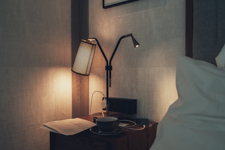 Modern bedside lamps casting a cozy glow in a hotel room