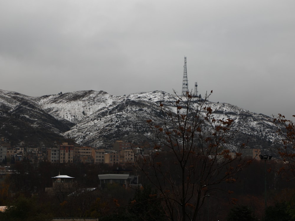 a view of a city with a mountain in the background