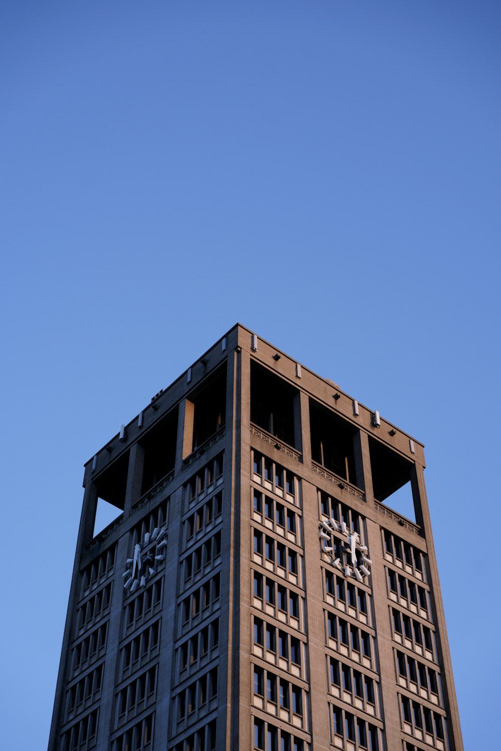 a tall building with a clock on the side of it