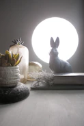 Softly lit image of a decorative table with terracotta and sand color variants