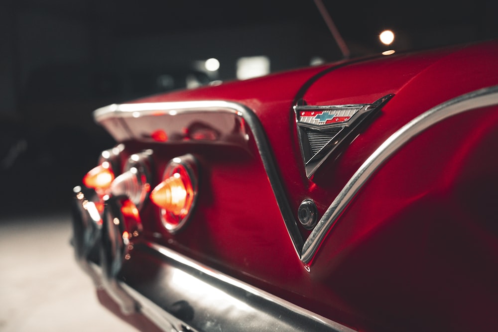 a close up of the tail lights of a classic car