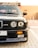 A sleek BMW M3 parked on a city street, showcasing its sporty design and enhanced performance features.
