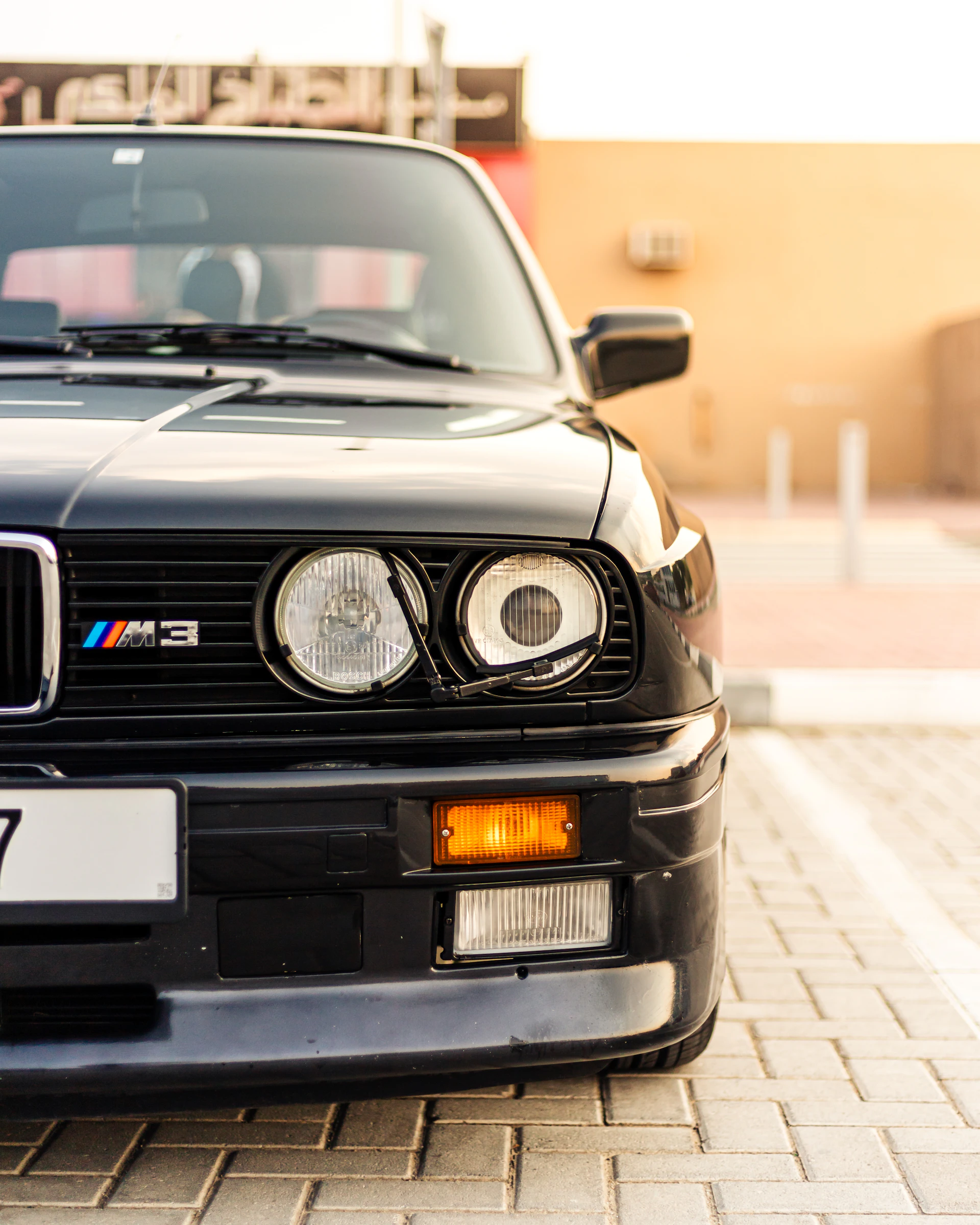 woman wearing yellow long-sleeved dress under white clouds and blue sky during daytime