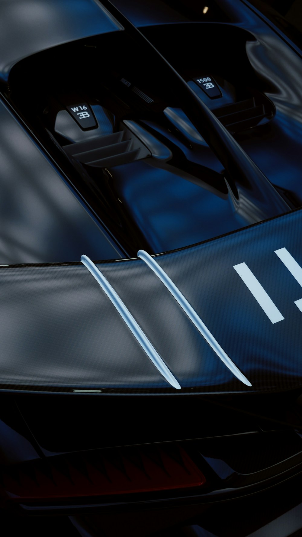 a close up of the hood of a sports car