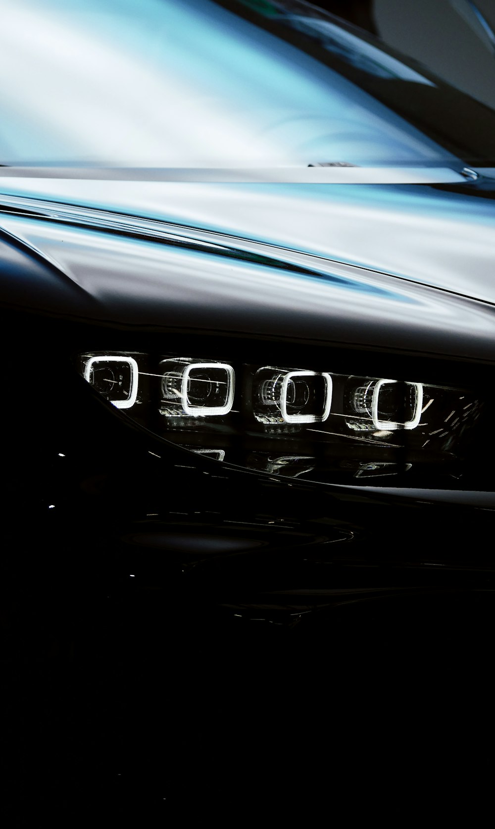 a close up of the front lights of a car
