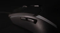 A high-resolution photo of a gaming mouse with customizable buttons.