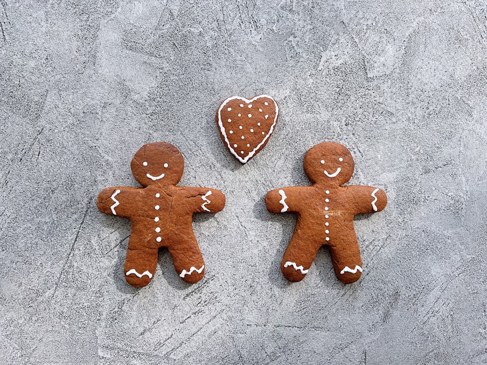 a couple of ginger cookies sitting on top of a table