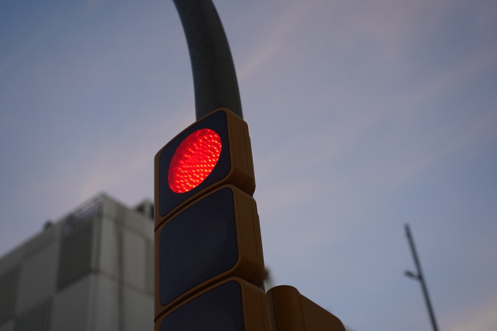 a traffic light with a red light on it