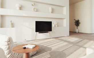 a living room with a large flat screen tv