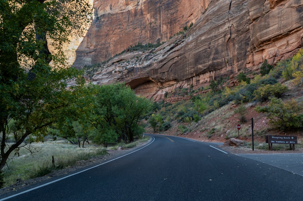 a road with a sign on the side of it