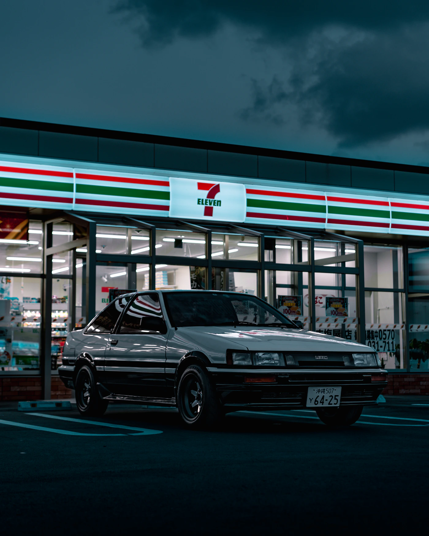 Car parked in front of a gas station