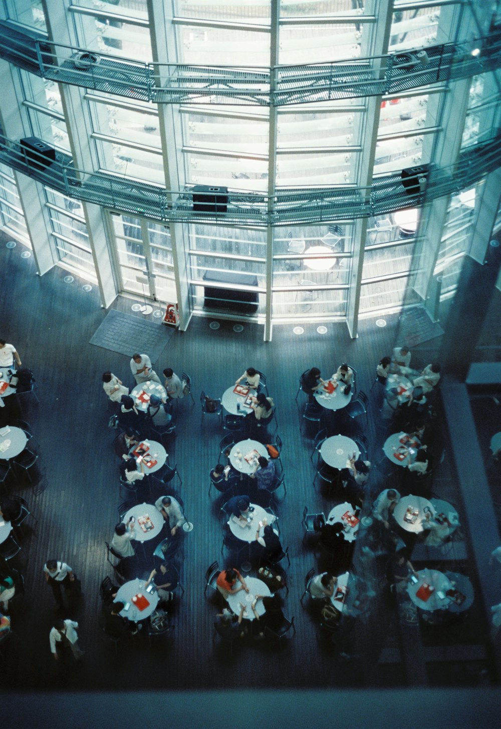 an overhead view of a restaurant with tables and chairs