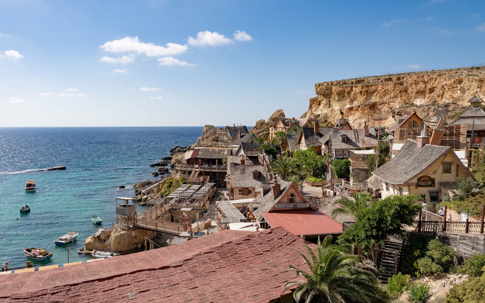 a village on the edge of a cliff overlooking the ocean