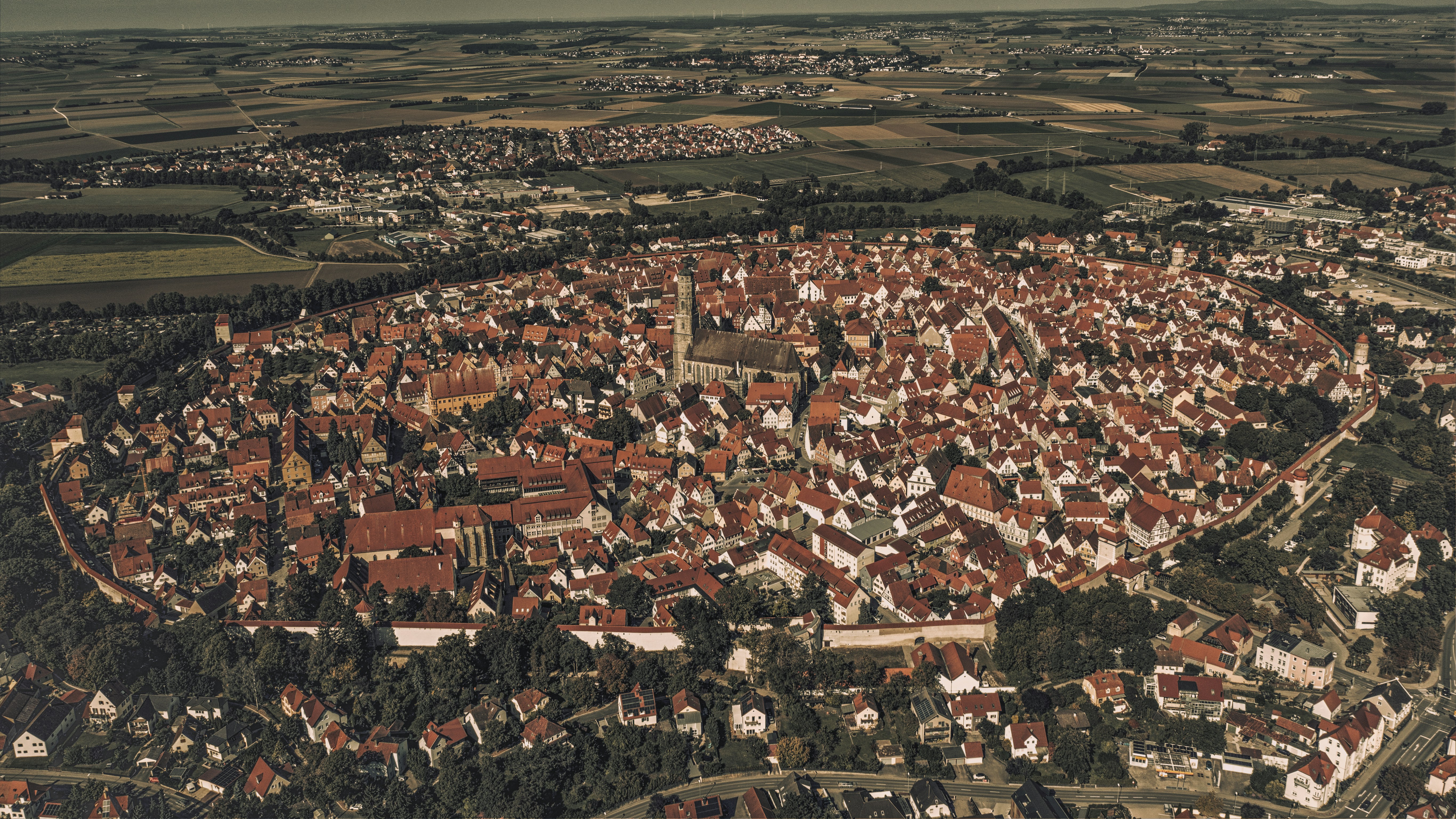 an aerial view of a city with lots of buildings
